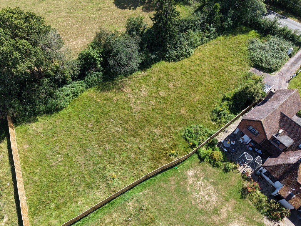 Lot: 53 - BUILDING PLOT WITH PLANNING FOR FOUR DWELLINGS - Hollytree plot from drone 4